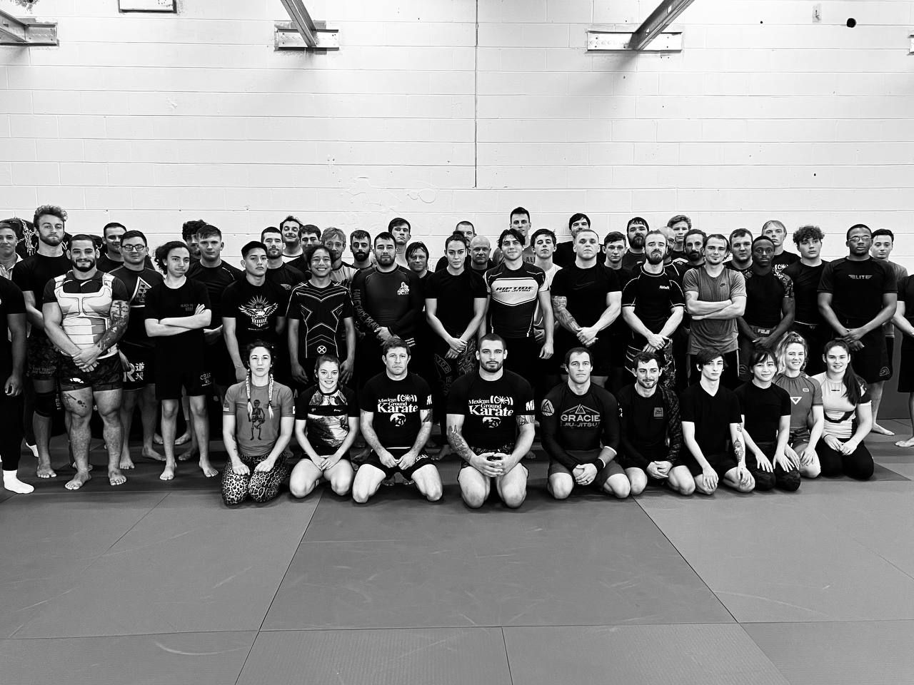 The whole team on the mats after class